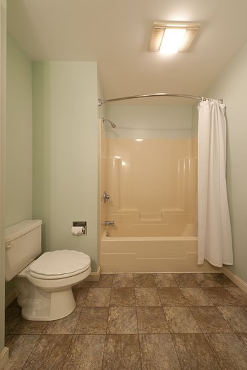 bathroom with a tile floor