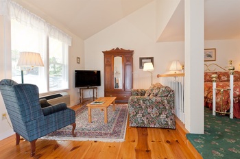wood floor and blue couch