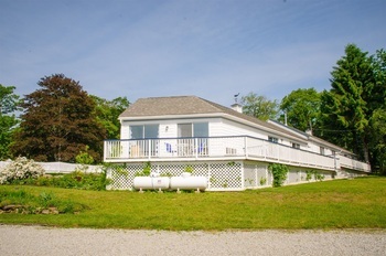 blue sky and motel building exterior