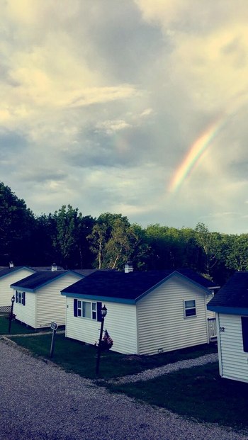 view of upper cottages from above with rainbow