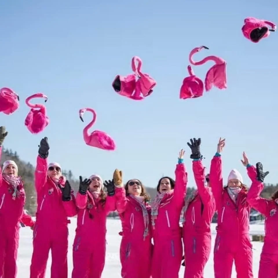 Women Toboggan Fest Team in pink outfits