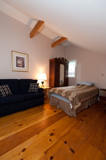 bed and wood floors 