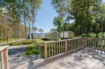 porch with the trees in the background