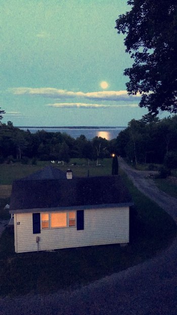 an upper cottage from a top view at night