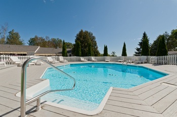 pool with wood deck